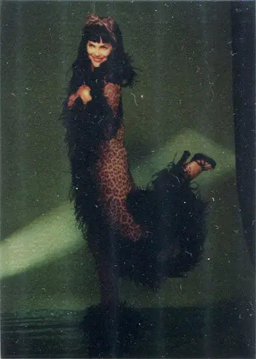 Mermaid-like figure with dark hair on Julie Strain Bettie 2000 Chromium trading card