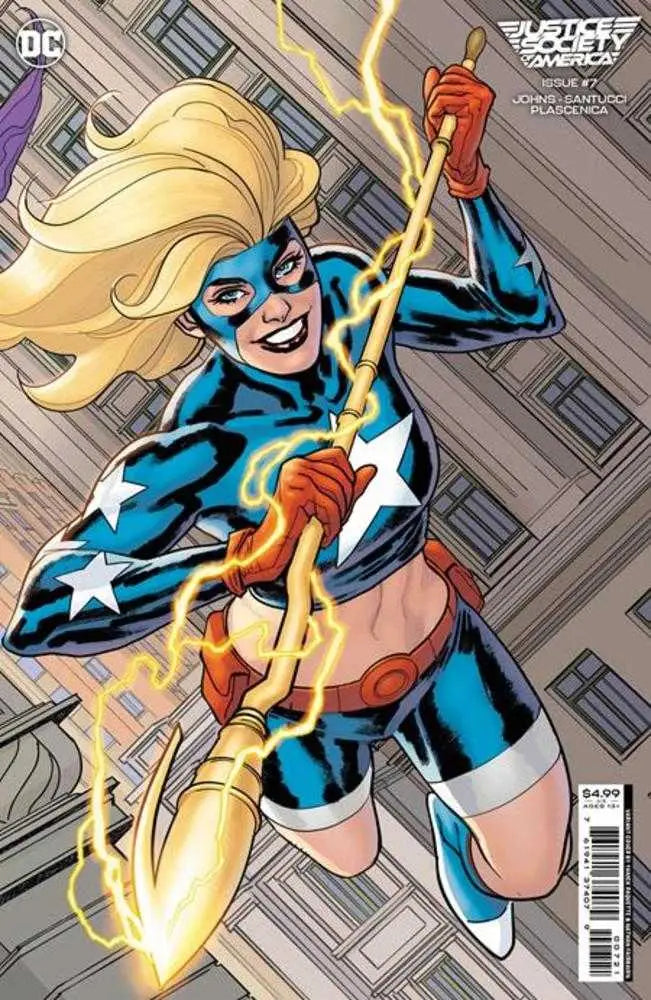 Superhero in blue and gold costume leaps with glowing staff, featured on Justice Society Of America trading cards