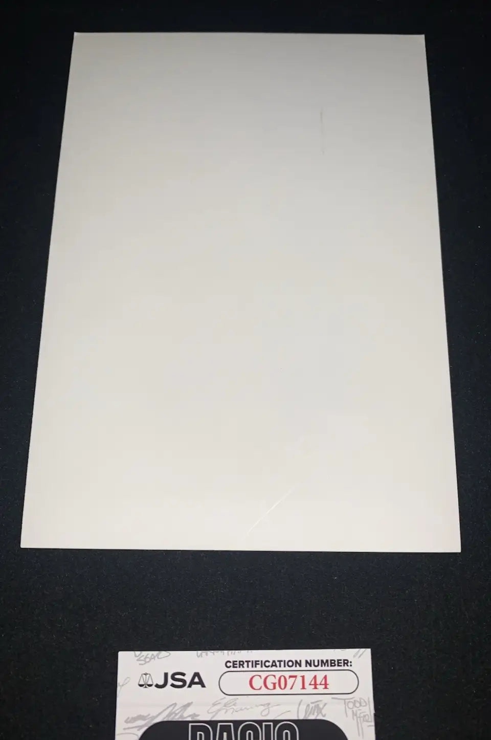 Blank white paper on Ken Caminiti Houston Astros signed 5x7 glossy team photo