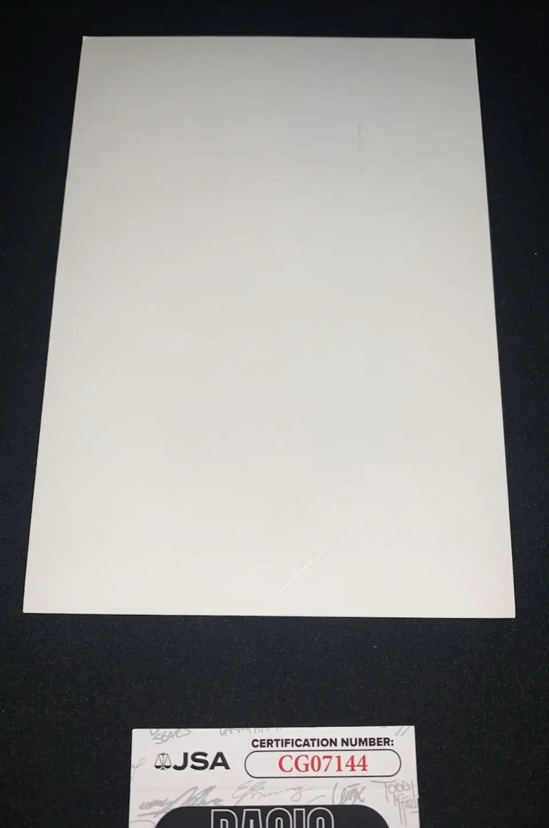 Blank white paper on Ken Caminiti Houston Astros signed 5x7 glossy team photo