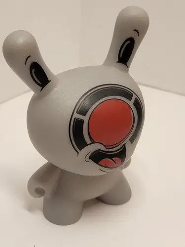 Gray vinyl Kidrobot Red Button Dunny figure with rabbit ears and red eye