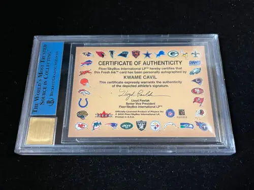 Kwame Cavil autographed card in protective case from Fleer Autographics rookie RC Texas