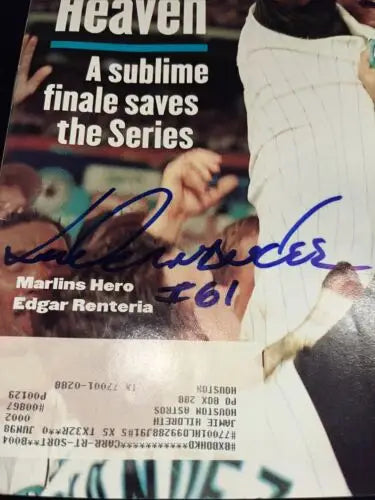 Hernandez signed auto Sports Illustrated magazine cover featuring 1997 WS MVP Liván Hernandez