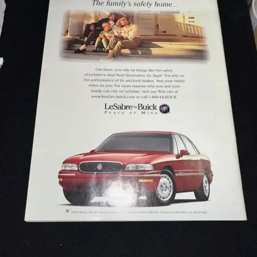 Buick LeSabre advertisement in Liván Hernandez signed auto Sports Illustrated magazine
