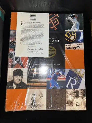 Sealed Baseball Hall of Fame yearbook featuring Robin Yount and Nolan Ryan for baseball cards