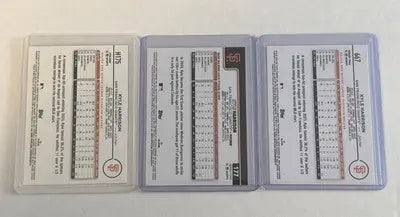 Three Kyle Harrison 2024/25 Topps Giants rookie and Future Stars baseball cards in protective sleeves