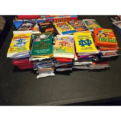 Lot of 75 multi/mixed-sport cards and non-sport trading cards in sealed packs