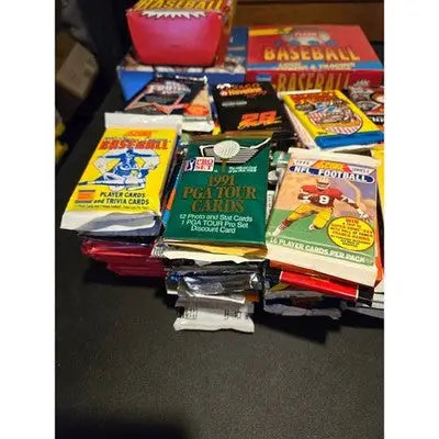 Lot of 75 multi/mixed-sport cards and non-sport trading cards in sealed packs