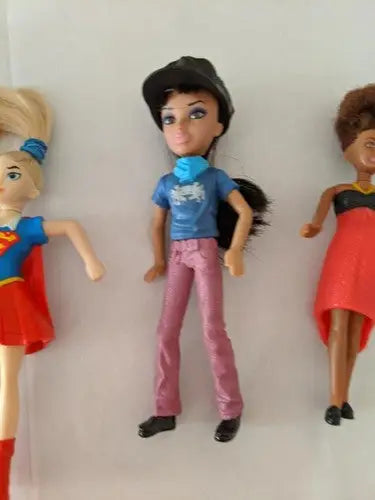 Three plastic McDonald’s toys from pre-owned lot on store shelf pulls