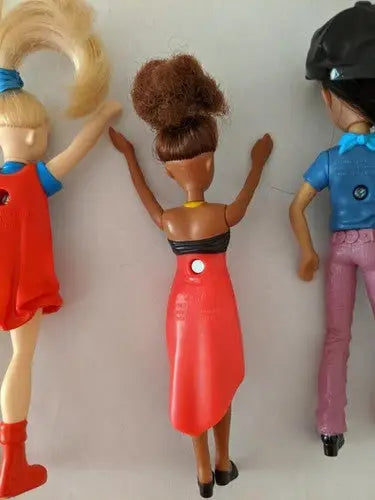 Pre-owned lot of McDonald’s toys store shelf pulls featuring three plastic dolls