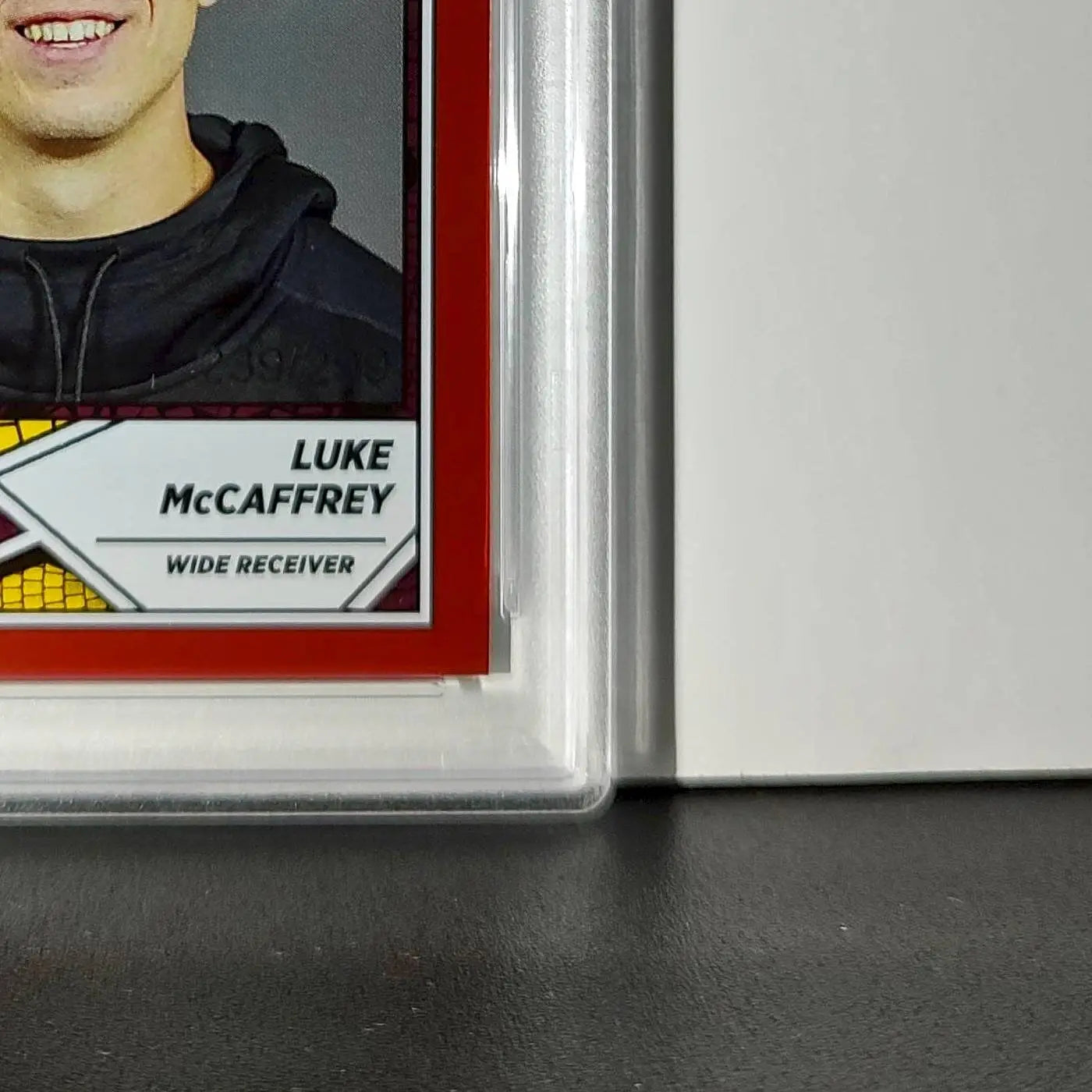 Luke McCaffrey 2024 Panini Sticker Collection 239/299 #99 Rookie Red Foil PSA 8 - Football Card Single