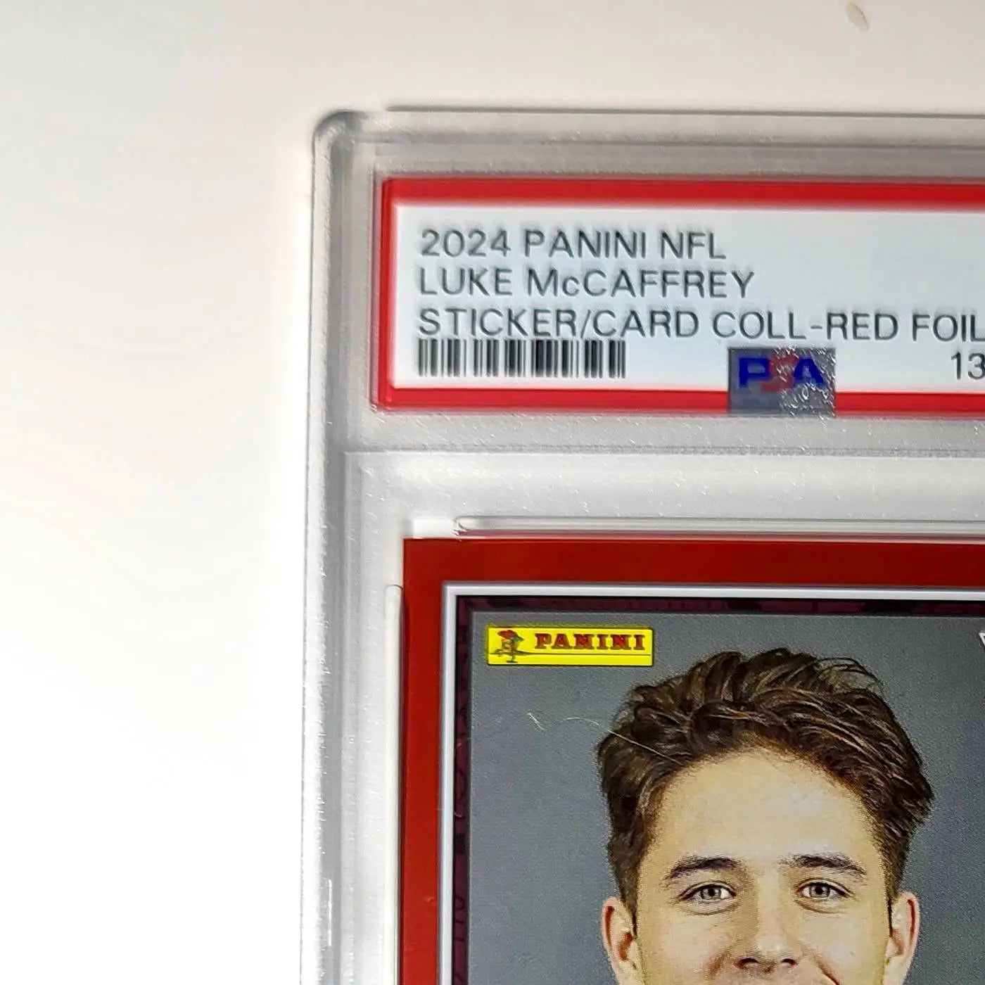 Luke McCaffrey 2024 Panini Sticker Collection 239/299 #99 Rookie Red Foil PSA 8 - Football Card Single