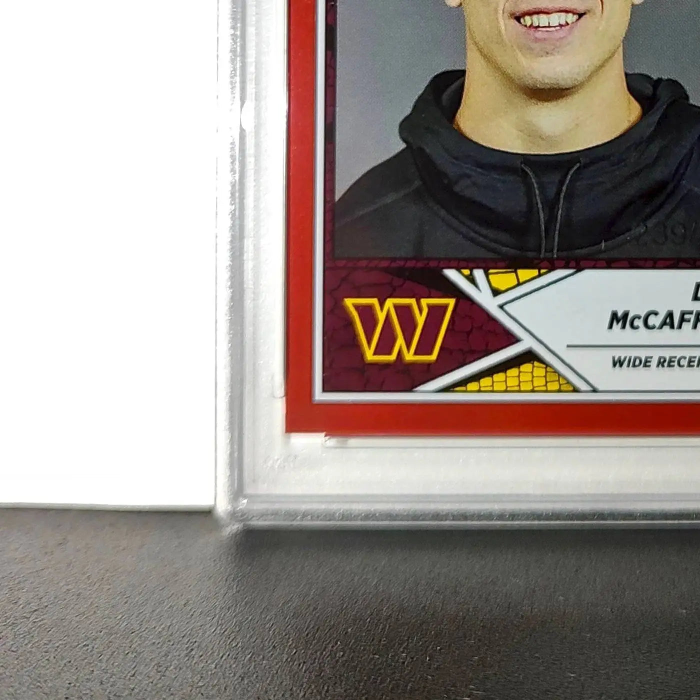 Luke McCaffrey 2024 Panini Sticker Collection 239/299 #99 Rookie Red Foil PSA 8 - Football Card Single