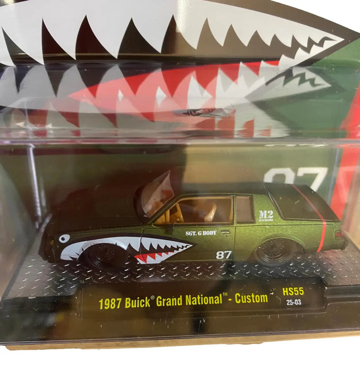 Military-style 1987 Buick Grand National custom die-cast model with shark teeth art