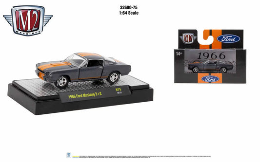 Die-cast model of a 1966 Ford Mustang GT in gray and orange for M2 Machines Auto Authentic