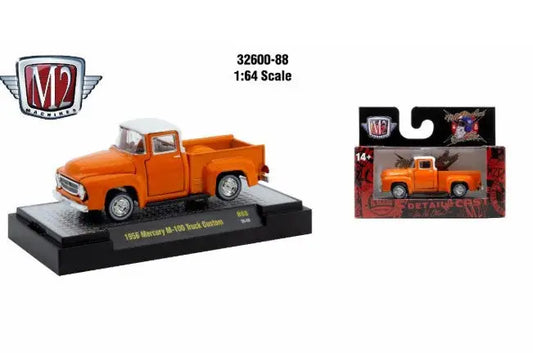 Orange and white Detroit Muscle R88 1956 Mercury M-100 truck custom model on display