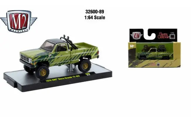 Green and black toy truck from Detroit Muscle R89 GMC Sierra Grande 15 4x4