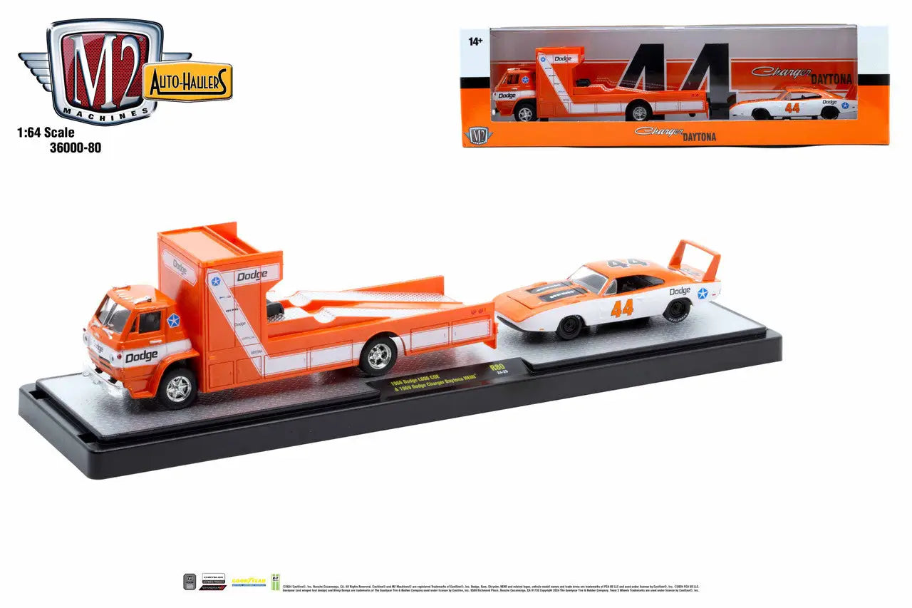 Orange Auto Transport Truck with a white Dodge Charger Daytona on M2 Machines Auto Hauler
