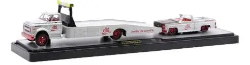Toy truck hauler featuring Chevrolet C60 Truck and 79 Chevy Silverado on flatbed