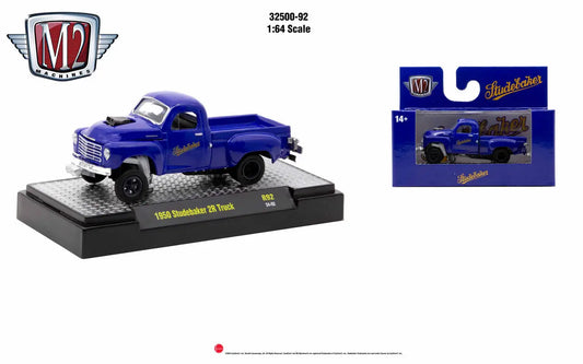 Blue 1950 Studebaker 2R die-cast truck model with retail packaging, great for collectors