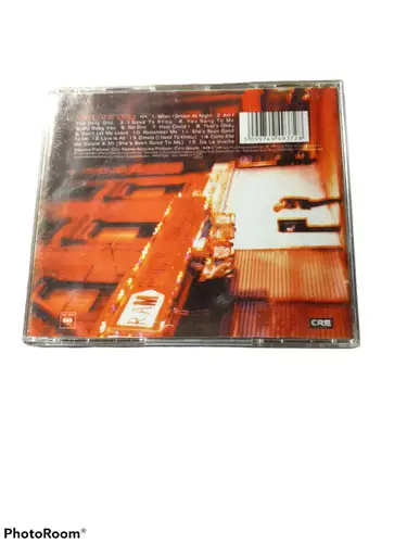 Marc Anthony original gloss CD album with orange-red abstract back cover and barcode