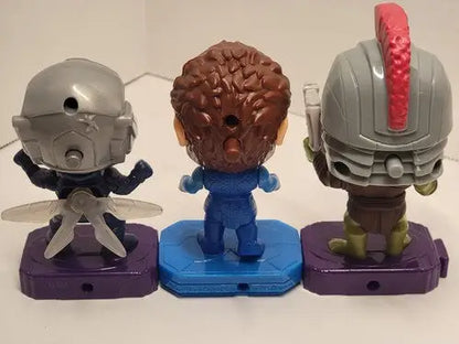 Colorful Marvel Avengers Endgame collectible toy figures on bases from McDonalds Toys 2020