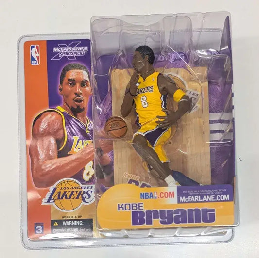 Packaged Kobe Bryant action figure from McFarlane’s Sports Picks 2003 NBA in yellow uniform
