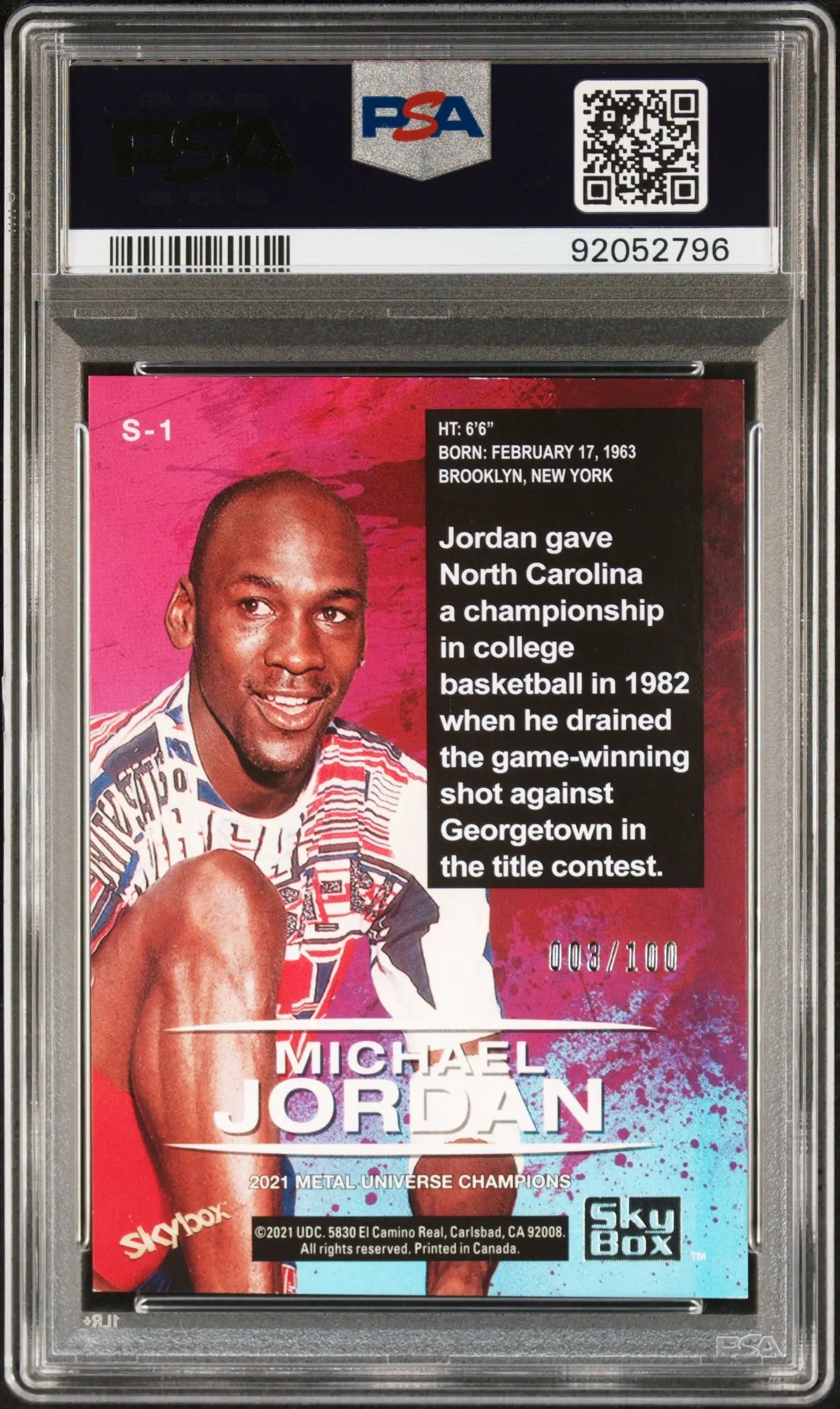 PSA-graded Michael Jordan Upper Deck Metal Universe Star Rubies basketball card on red background