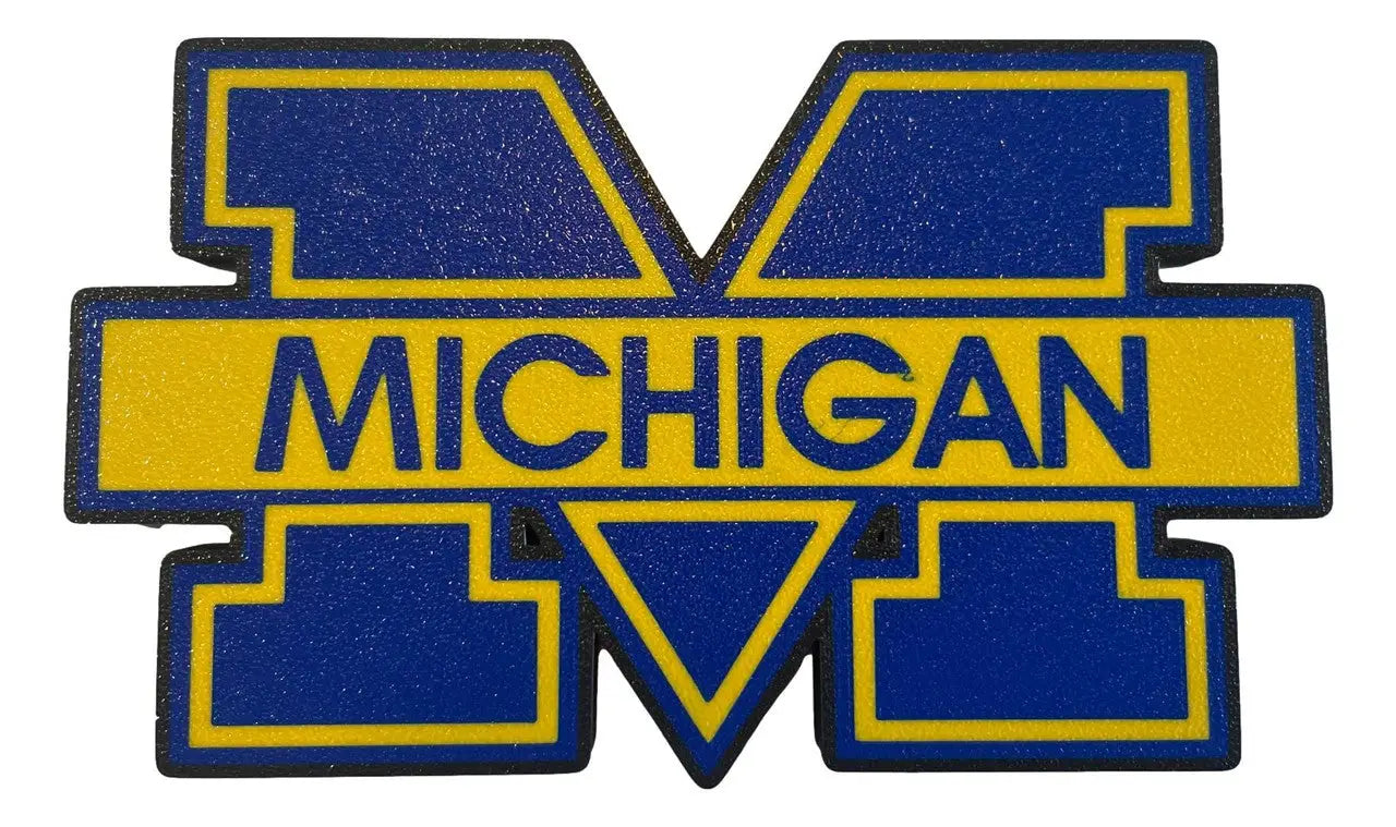 Blue and yellow Michigan Wolverines logo magnet wall display made of PLA plastic