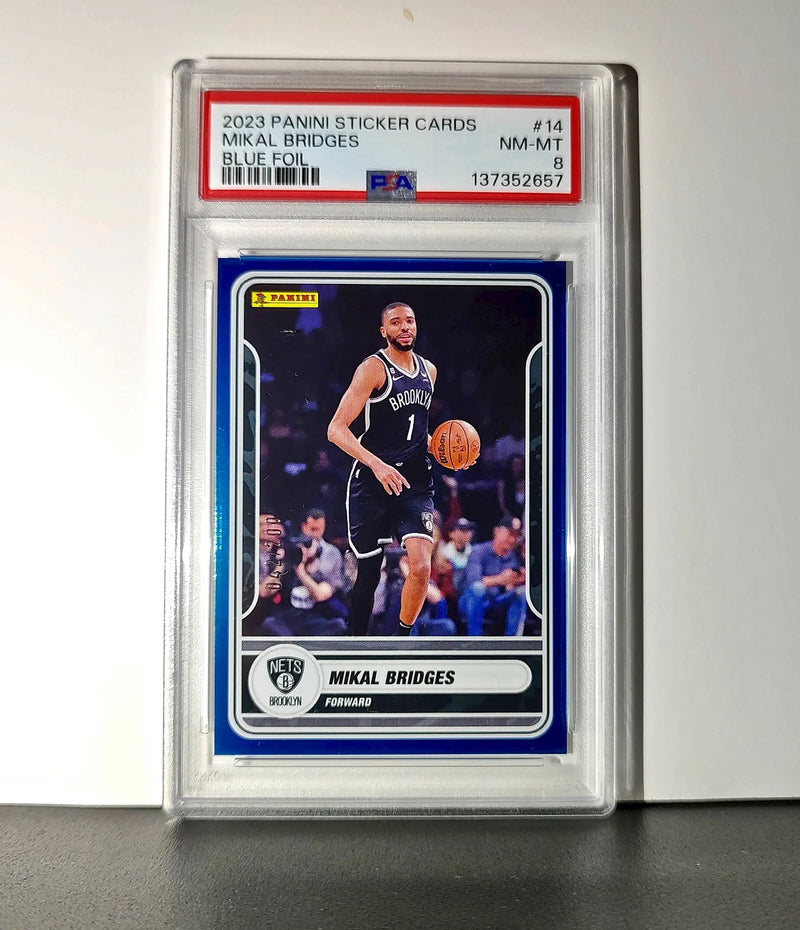 Mikal Bridges 2023-24 Panini Sticker Cards #14 042/200 Blue Foil PSA 8 NM-MT