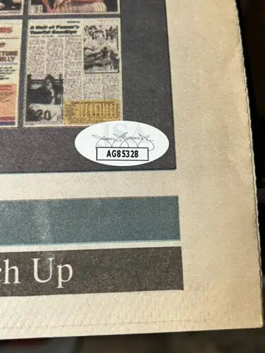 Framed newspaper clippings with authentication sticker for Mike Schmidt signed Sporting News