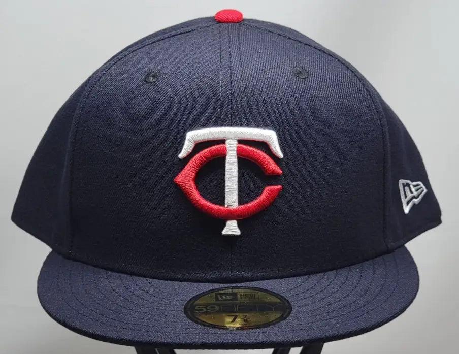Navy blue Minnesota Twins MLB Era 59FIFTY fitted cap with red and white logo