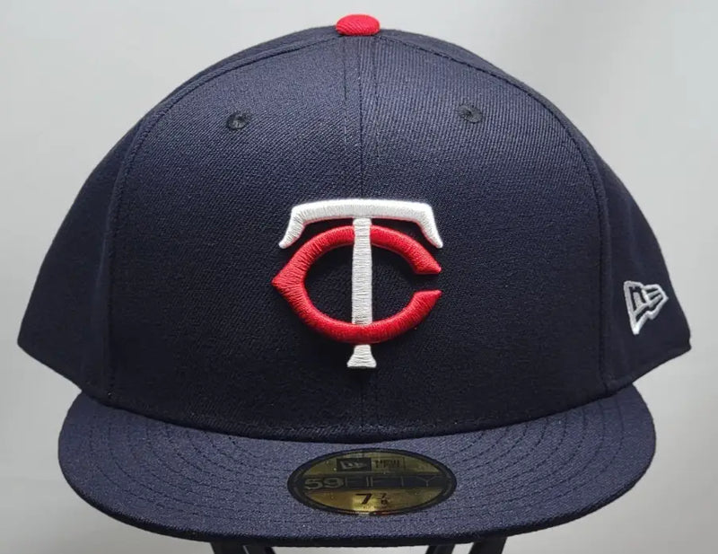 Navy blue Minnesota Twins MLB Era 59FIFTY fitted cap with red and white logo