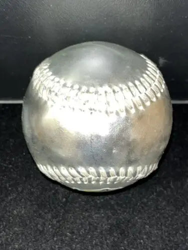 Silver collectible ball with white stitching from MLB Baseball Winter Meetings 2003