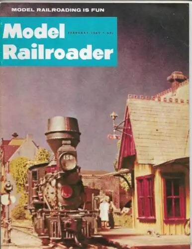 Vintage model railroader magazine cover featuring classic train model railroading scenes