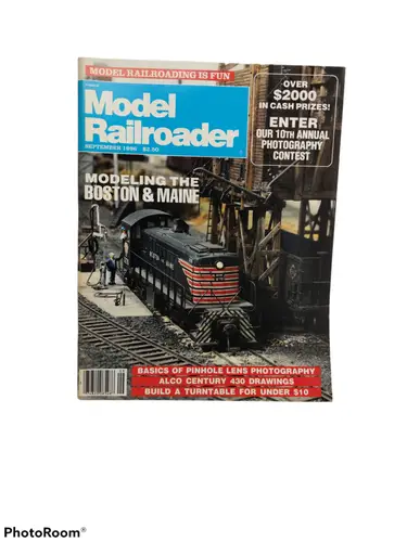 Vintage Model Railroader magazine on store shelf pulls featuring modeling the Boston & Maine train