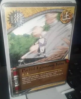 Naruto TCG 842 Partial Expansion Jutsu S22 Weapons of War Rainbow Letters Rare