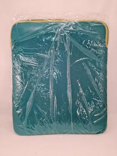 Teal neoprene blue lime tablet sleeve with lime green zippered yellow zipper wrapped in plastic