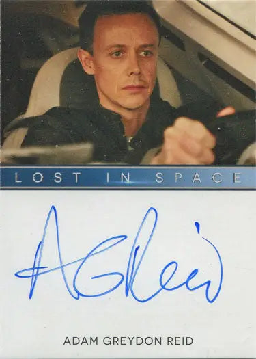 Autographed trading card of Adam Greydon Reid in driver’s seat from Lost in Space