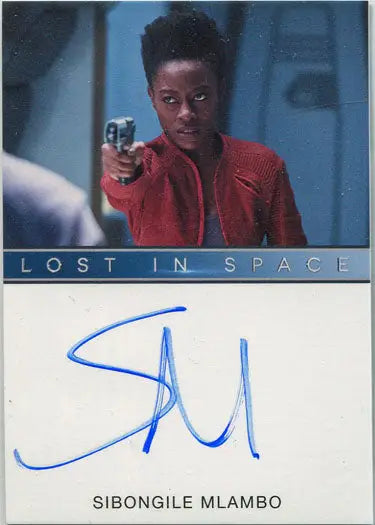 Autograph card of Sibongile Mlambo as Angela Goddard in red outfit holding a gun