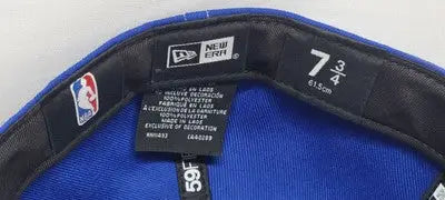 Interior view of Blue NEW ERA 5950 59FIFTY Philadelphia 76ers fitted hat side script
