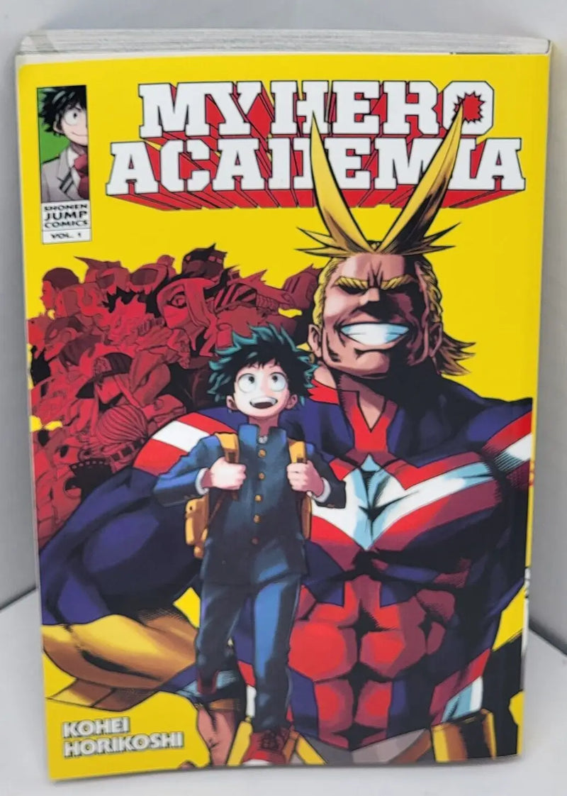 Vibrant yellow My Hero Academia volume featuring All Might and Izuku Midoriya paperback