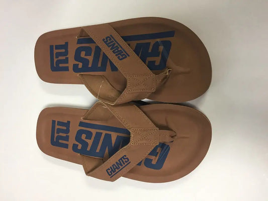 Brown flip-flops with blue Surf branding and New York Giants team logo display