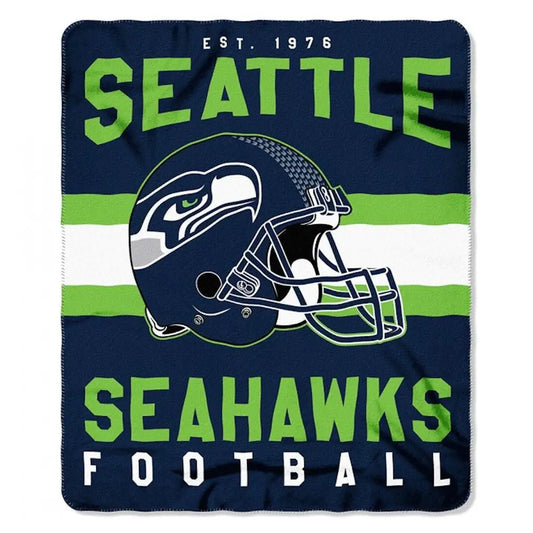 Seattle Seahawks football helmet on an officially licensed fleece throw blanket