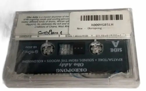 Used audio cassette in clear plastic case featuring Okropong Obo Addy traditional music