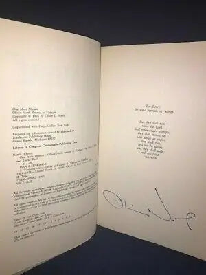 Open book with text and signature in One More Mission by Oliver North and David Roth