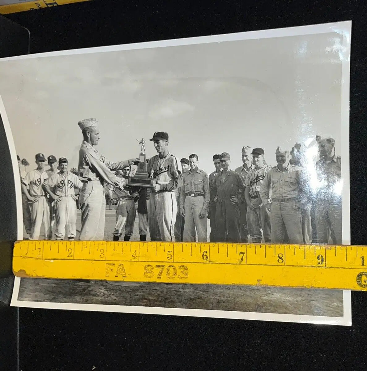 Vintage baseball trophy presentation featuring the Original World War II 5th Air Force team