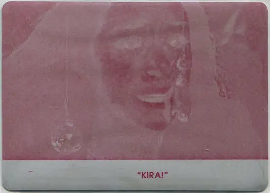 Faded reddish image of a face on Orphan Black Season 1 Printing Plate Base Card 71 Magenta