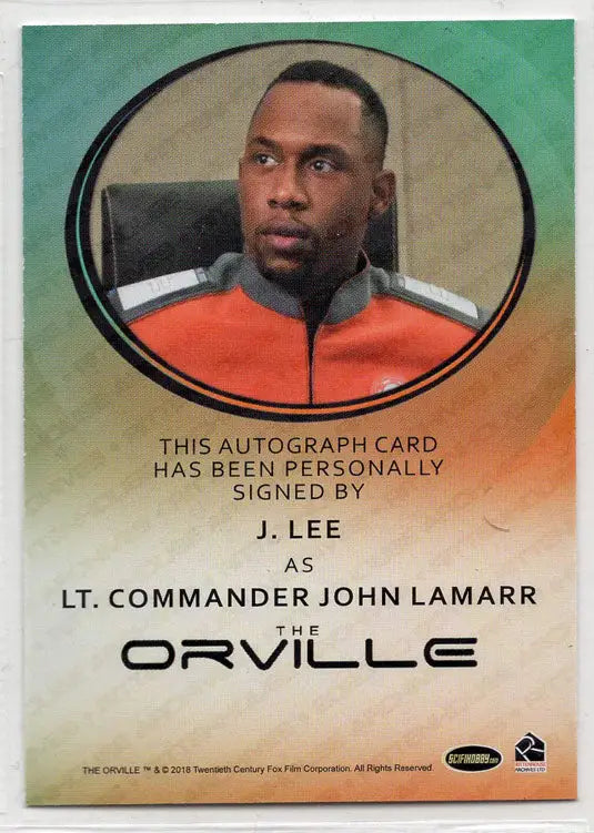 Autograph card of John Lamarr in orange uniform from The Orville trading cards collection