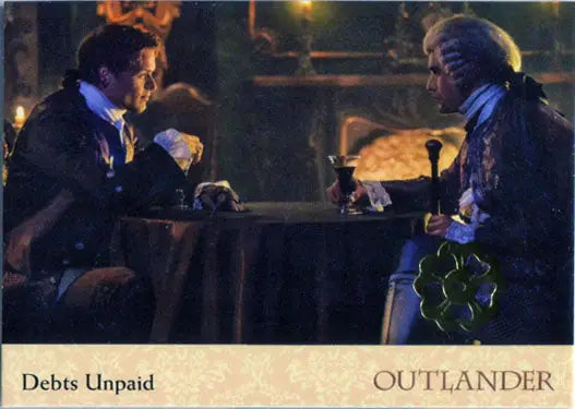 Scene from Outlander showcasing characters in period costume at a table, Gold Jacobite Seal